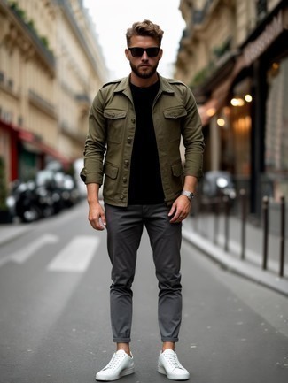 Olive Military Jacket · Black Crew-neck T-shirt · Grey Chinos · White Leather Low Top Sneakers · Black Sunglasses · Silver Watch