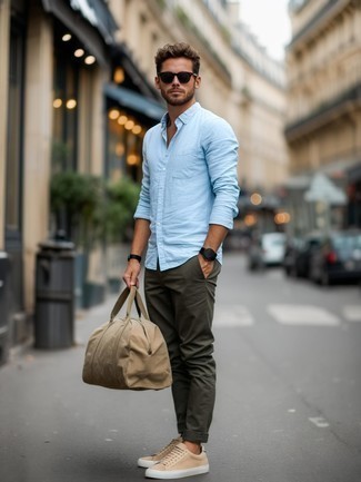 Light Blue Long Sleeve Shirt · Olive Chinos · Beige Canvas Low Top Sneakers · Beige Canvas Duffle Bag · Black Sunglasses · Black Leather Watch