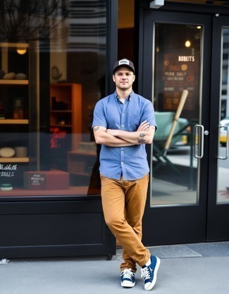 Blue Short Sleeve Shirt · Tobacco Chinos · Navy Low Top Sneakers · Brown Baseball Cap