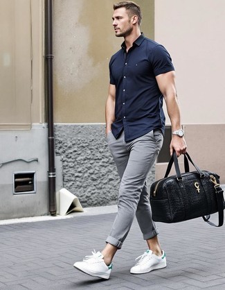 Navy Short Sleeve Shirt · Grey Chinos · White Leather Low Top Sneakers · Black Leather Holdall · Silver Watch