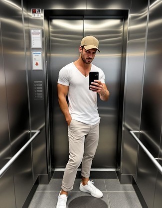 White Crew-neck T-shirt · Beige Chinos · White Low Top Sneakers · Tan Baseball Cap