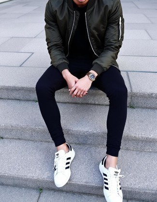 Dark Green Bomber Jacket · Black Crew-neck T-shirt · Black Sweatpants · White and Black Leather Low Top Sneakers · Gold Watch