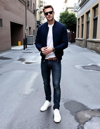 Navy Bomber Jacket · White Crew-neck T-shirt · Navy Jeans · White Leather Low Top Sneakers · Brown Leather Belt · Navy Sunglasses