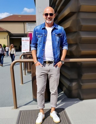 Blue Denim Jacket · White Crew-neck T-shirt · Grey Chinos · White Leather Low Top Sneakers · Black Leather Belt · Dark Purple Sunglasses