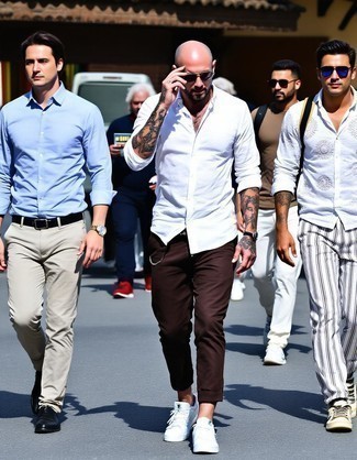 White Long Sleeve Shirt · Dark Brown Chinos · White Low Top Sneakers · Black Sunglasses