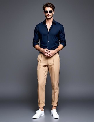 Navy Long Sleeve Shirt · Khaki Chinos · White Leather Low Top Sneakers · Black Sunglasses