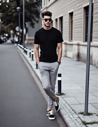 Black Crew-neck T-shirt · Grey Chinos · Black and White Canvas Low Top Sneakers · Black Sunglasses · Silver Watch