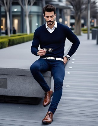 Navy V-neck Sweater · White Long Sleeve Shirt · Navy Skinny Jeans · Brown Leather Desert Boots · Black Sunglasses · Black Leather Watch