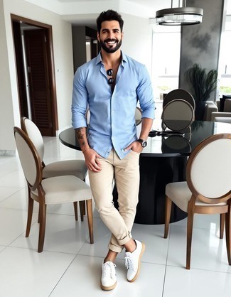 Light Blue Linen Long Sleeve Shirt · Khaki Chinos · White Leather Low Top Sneakers · Black Sunglasses · Black Leather Watch