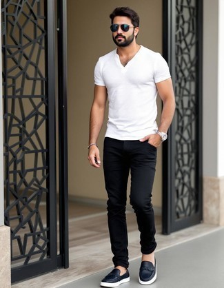 White Polo · Black Jeans · Black Fringe Leather Loafers · Dark Brown Sunglasses · Silver Watch · Silver Bracelet