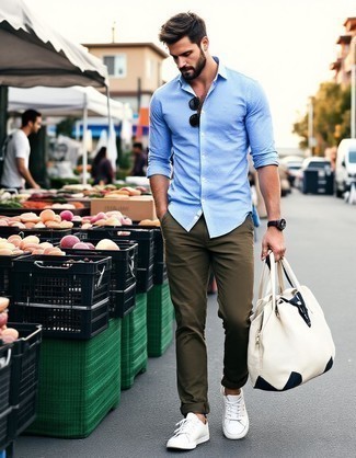 Light Blue Long Sleeve Shirt · Olive Chinos · Beige Canvas Low Top Sneakers · Beige Canvas Duffle Bag · Black Sunglasses · Black Leather Watch
