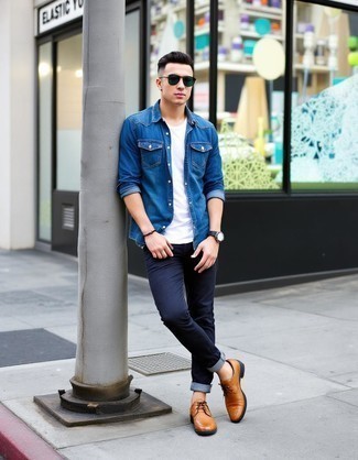 Blue Denim Shirt · White Crew-neck T-shirt · Navy Jeans · Tan Leather Oxford Shoes · Dark Green Sunglasses · Black Leather Watch