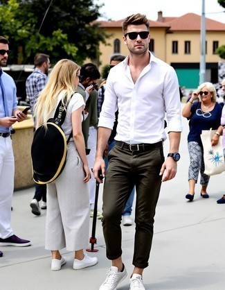 White Long Sleeve Shirt · Olive Chinos · Grey Suede Low Top Sneakers · Black Sunglasses · Navy Leather Watch · Dark Brown Leather Bracelet