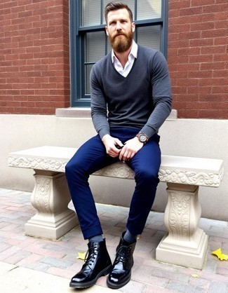 Navy V-neck Sweater · White Long Sleeve Shirt · Navy Chinos · Black Leather Casual Boots · Dark Brown Sunglasses · Black Leather Watch