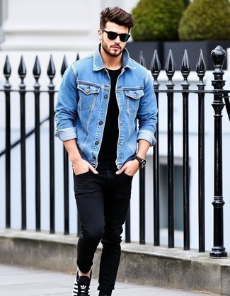 Light Blue Denim Jacket · Black Crew-neck T-shirt · Black Jeans · Black and White Leather Low Top Sneakers · Dark Green Sunglasses · Dark Brown Leather Watch