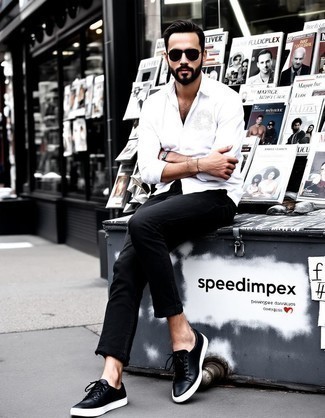 White Long Sleeve Shirt · Black Jeans · Black Leather Low Top Sneakers · Black Sunglasses