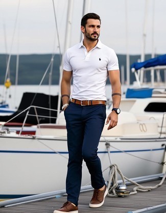 White Polo · Navy Chinos · Brown Leather Low Top Sneakers · White and Navy Horizontal Striped Canvas Belt · Navy Leather Watch · White Beaded Bracelet