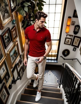 Red Polo · Beige Chinos · White Leather Low Top Sneakers · Black Sunglasses · Tan Leather Watch