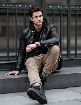 Black Leather Bomber Jacket · Black Hoodie · Khaki Chinos · Black Leather Casual Boots · Silver Watch · Beige Socks