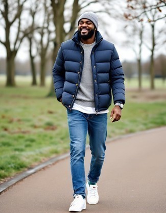 Navy Puffer Jacket · Grey Crew-neck Sweater · White Crew-neck T-shirt · Blue Jeans · White Canvas Low Top Sneakers · Grey Beanie