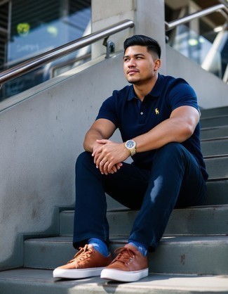 Navy Polo · Navy Jeans · Brown Leather Low Top Sneakers · Gold Watch · Blue Print Socks