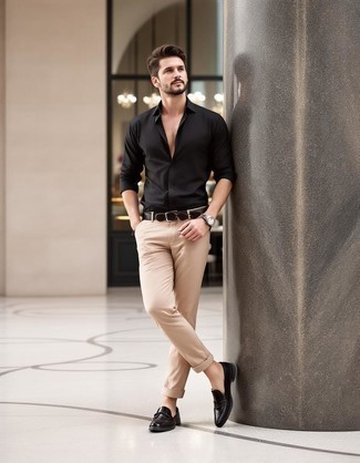 Black Long Sleeve Shirt · Khaki Chinos · Black Leather Tassel Loafers · Dark Brown Sunglasses · Black Leather Watch · Dark Brown Beaded Bracelet