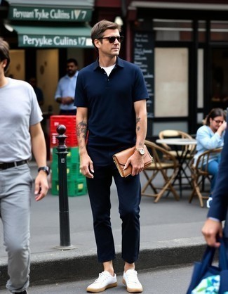 Navy Polo · White Crew-neck T-shirt · Navy Chinos · White Canvas Low Top Sneakers · Tobacco Leather Zip Pouch · Dark Brown Sunglasses