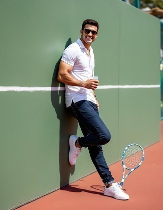 White Polo · Navy Jeans · White Leather Low Top Sneakers · Black Sunglasses