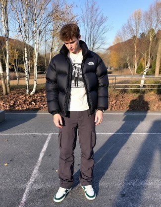 Black Puffer Jacket · White and Black Print Crew-neck T-shirt · Dark Brown Chinos · White and Green Leather Low Top Sneakers
