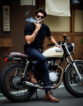 Black Crew-neck T-shirt · Navy Jeans · Dark Brown Leather Casual Boots · Charcoal Sunglasses · Silver Watch · Multi colored Beaded Bracelet
