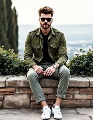 Olive Military Jacket · Black Crew-neck T-shirt · Grey Chinos · White Leather Low Top Sneakers · Black Sunglasses · Silver Watch