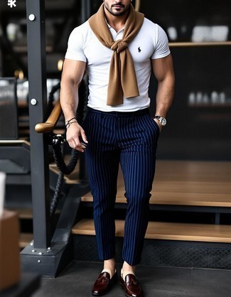Brown Crew-neck Sweater · White Polo · Navy Vertical Striped Chinos · Dark Brown Leather Tassel Loafers · Black Sunglasses · Black Leather Watch