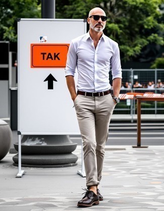 White Long Sleeve Shirt · Beige Chinos · Dark Brown Leather Derby Shoes · Dark Brown Leather Belt · Black Sunglasses · Silver Watch