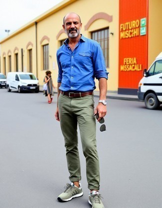 Light Blue Chambray Long Sleeve Shirt · Olive Chinos · Olive Athletic Shoes · Dark Brown Leather Belt · Dark Green Sunglasses · Silver Watch