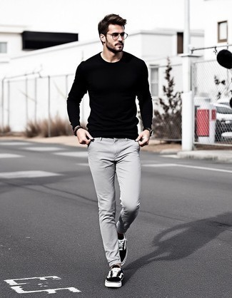 Black Long Sleeve T-Shirt · Grey Chinos · Black and White Canvas Low Top Sneakers · Silver Watch · Brown Beaded Bracelet