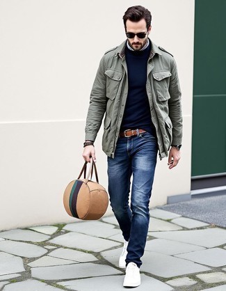 Dark Green Military Jacket · Navy Turtleneck · Blue Jeans · White Leather Low Top Sneakers · Brown Canvas Duffle Bag · Brown Woven Leather Belt