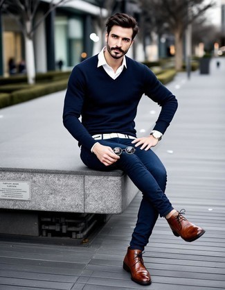 Navy V-neck Sweater · White Long Sleeve Shirt · Navy Skinny Jeans · Brown Leather Desert Boots · Black Sunglasses · Black Leather Watch