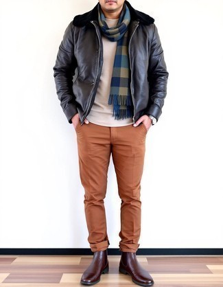 Black Shearling Jacket · Beige Crew-neck Sweater · Tobacco Chinos · Dark Brown Leather Chelsea Boots · Olive Plaid Scarf · Silver Watch