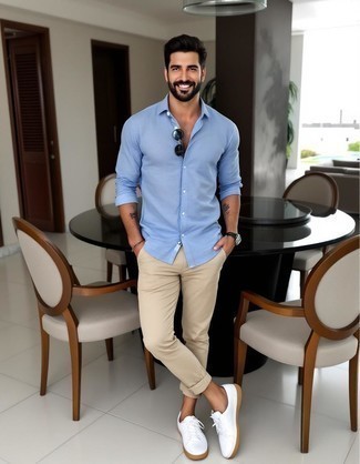 Light Blue Linen Long Sleeve Shirt · Khaki Chinos · White Leather Low Top Sneakers · Black Sunglasses · Black Leather Watch