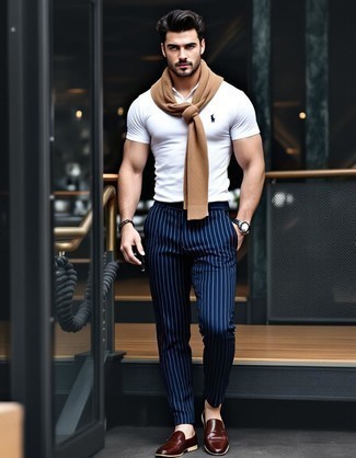 Tan Crew-neck Sweater · White Polo · Navy Vertical Striped Dress Pants · Dark Brown Leather Tassel Loafers · Black Leather Watch