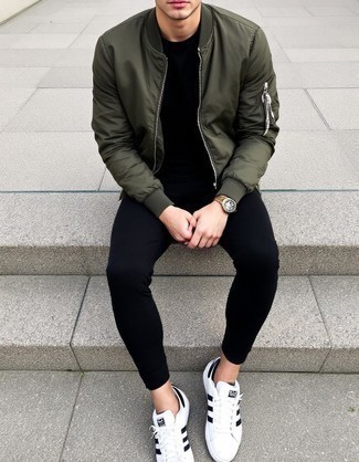 Dark Green Bomber Jacket · Black Crew-neck T-shirt · Black Sweatpants · White and Black Leather Low Top Sneakers · Gold Watch