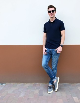 Black Polo · Blue Jeans · Grey Canvas Low Top Sneakers · Black Sunglasses · Black Leather Watch