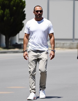 White Crew-neck T-shirt · Beige Chinos · White Athletic Shoes · Dark Brown Sunglasses · Olive Leather Watch · White Leather Bracelet