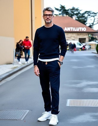 Navy Crew-neck Sweater · White Crew-neck T-shirt · Navy Jeans · White Athletic Shoes · Black Rubber Watch · Navy Socks
