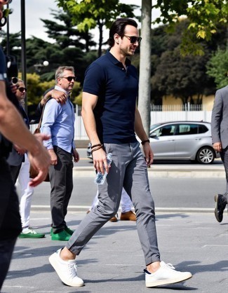 Navy Polo · Grey Chinos · White Leather Low Top Sneakers · Black Sunglasses