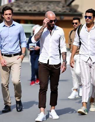 White Long Sleeve Shirt · Dark Brown Chinos · White Low Top Sneakers · Black Sunglasses