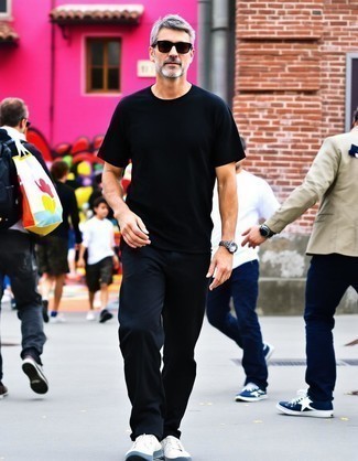 Black Crew-neck T-shirt · Black Chinos · White Low Top Sneakers · Clear Sunglasses · Silver Watch