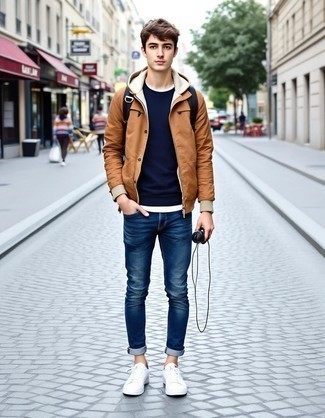 Tan Windbreaker · White Crew-neck T-shirt · Black Crew-neck T-shirt · Blue Jeans · White Canvas Low Top Sneakers · Black Canvas Backpack