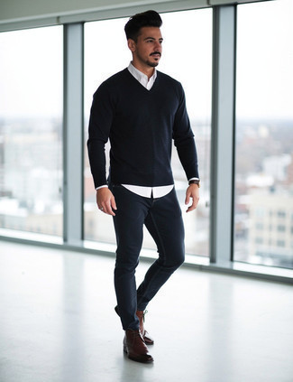 Navy V-neck Sweater · White Long Sleeve Shirt · Navy Skinny Jeans · Brown Leather Desert Boots · Black Sunglasses · Black Leather Watch