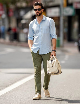 Light Blue Long Sleeve Shirt · Olive Chinos · Beige Canvas Low Top Sneakers · Beige Canvas Duffle Bag · Black Sunglasses · Black Leather Watch